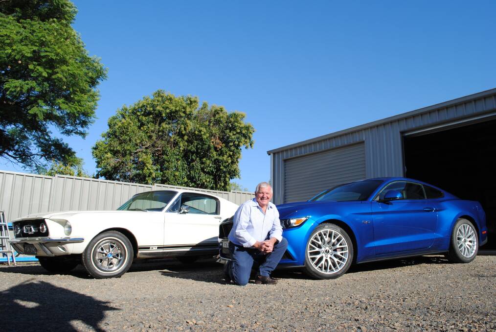 Difficult Choice: With a pair of GT Mustangs 50 years apart you can rest assured it  wouldn't be easy deciding which car Parkes' John Kennedy prefers to drive. Photo: Jeff McClurg