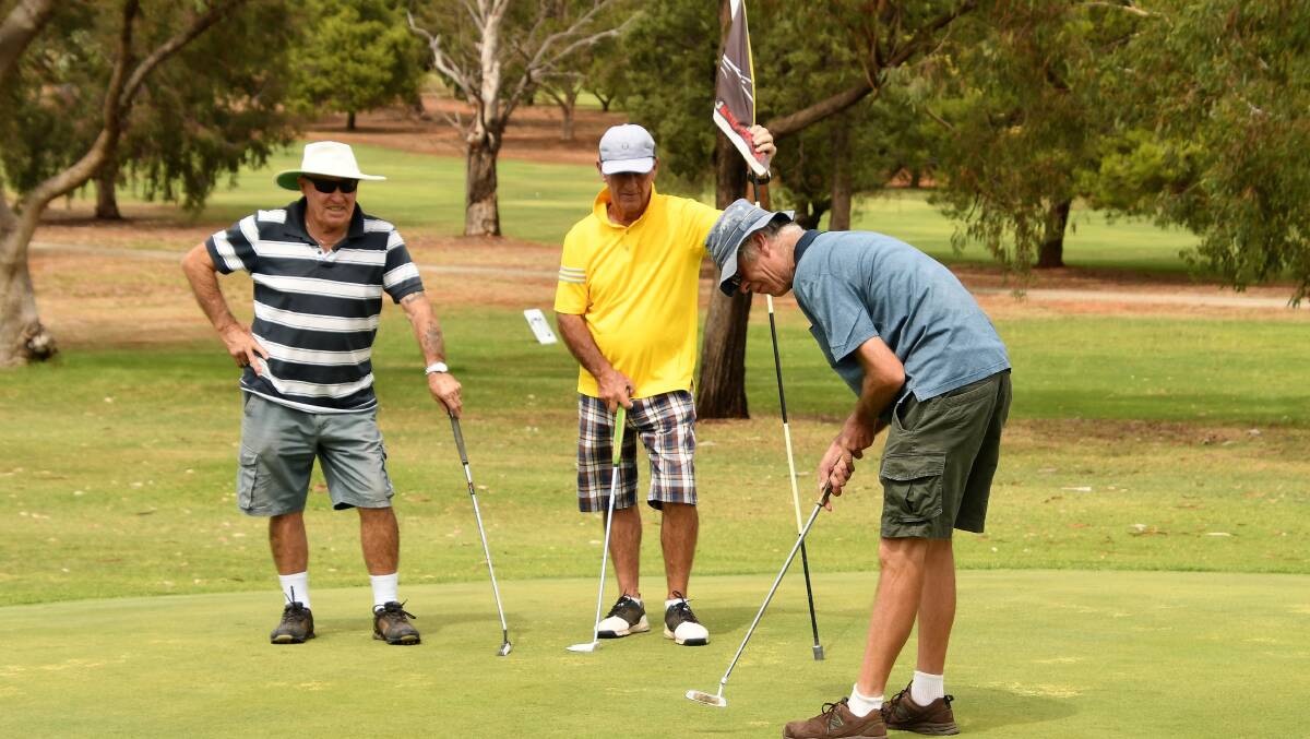 TEE-OFF: Parkes golfers John Davies, Phil Bishop and Chris Goode enjoy a day on the green recently at the Parkes Golf Club. Photo: Jenny Kingham