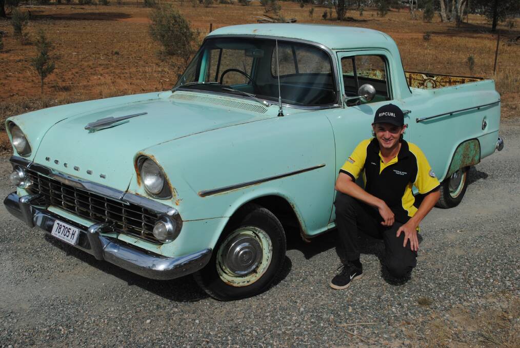 A BEAUTY: Luke Magill is just 15 years old and there's no lack of enthusiasm when it comes to his passion for cars, including for this 1961 EK Holden ute. Photo: Jeff McClurg