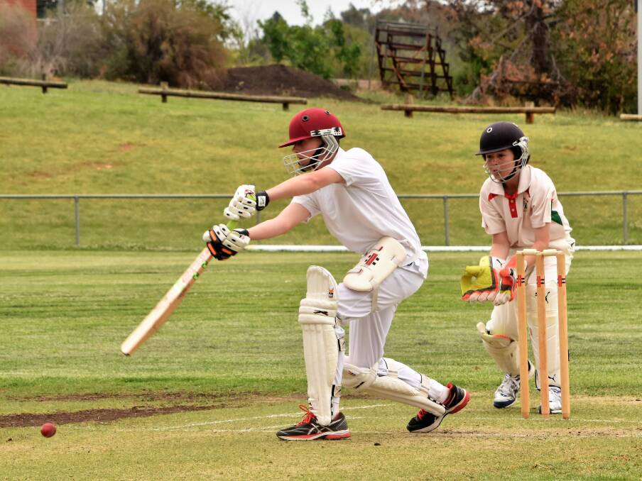 Hawkes wicket keeper: Hunter Hawke prepares as Bayliss batsman Tyler Yeo takes a shot. Photos: Jenny Kingham.