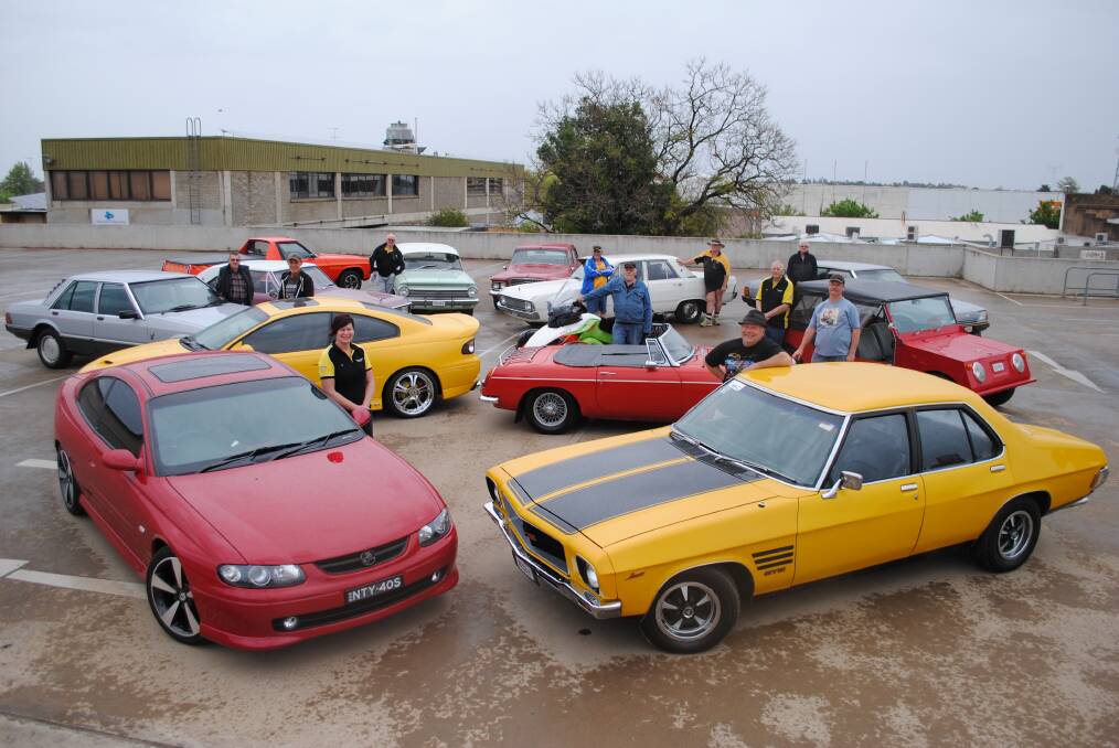 Central West Car Club members with some of the vehicles they hope to have on display at Saturday’s Charity Show and Shine at Pioneer Oval. 