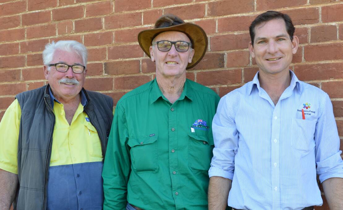HELPING HANDS: Aussie Helpers founder Brian Egan, volunteer Paul Pitstock and Parkes Shire's Drought Response Officer Roger Kitson are doing what they can to help struggling farmers. 