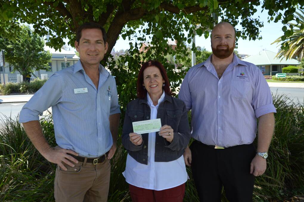 Drought Response Officer, Roger Kitson, Anglicare Manager Natalie Quince and Neighbourhood Central's Financial Controller, Rowen Pearce.