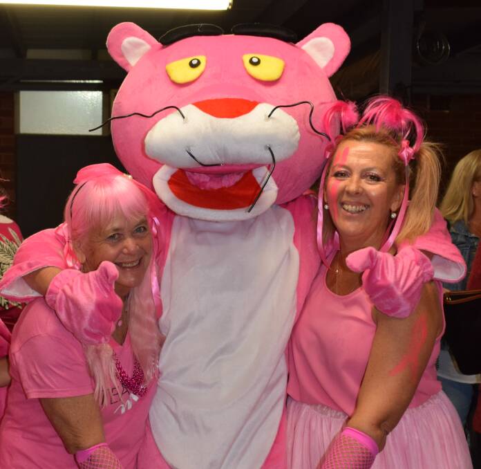 Debbie Veale, the Pink Panther and Carolyn Keep had a ball at last year's Cancer Council Pink Ribbon night in Trundle.