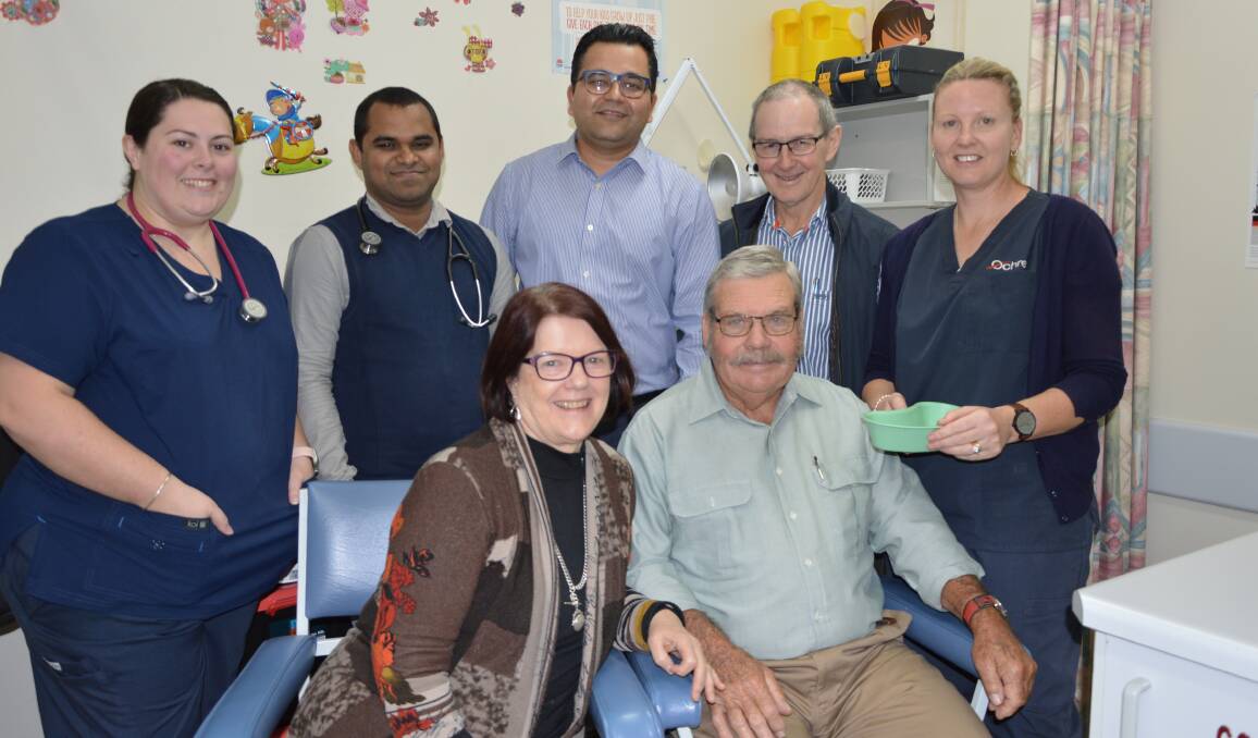 JABBED: Kerriean and Roger Hood (front) received their annual flu shots last week. They are pictured with Ochre Medical Centre staff Michaela Blockely-Ireland, Doctors Viraj Liyange, Neeraj Uprety and David Harwood, and Caroline Kennedy. 