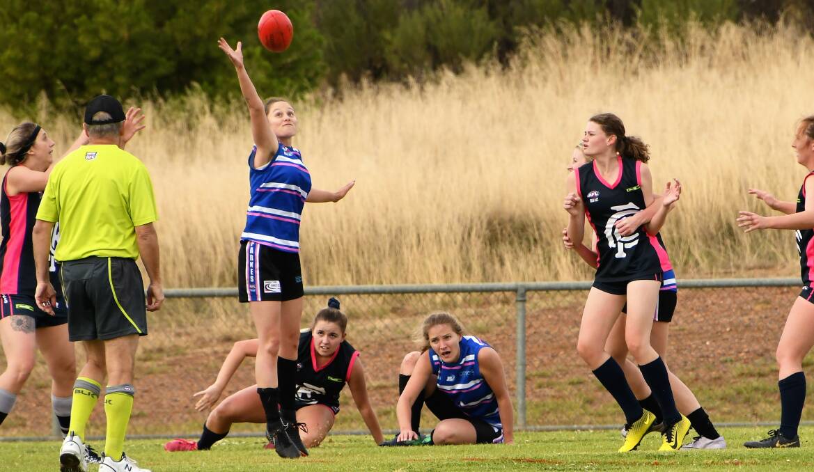 Cassandra Kelly reaches for the ball in a match against Cowra. Photo by Jenny Kingham 