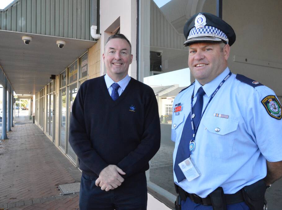 GRANT: Parkes Shire Council’s Information Services Manager Anthony McGrath and Chief Inspector David Cooper are pleased that the old analogue security cameras at the Parkes taxi rank will be upgraded.