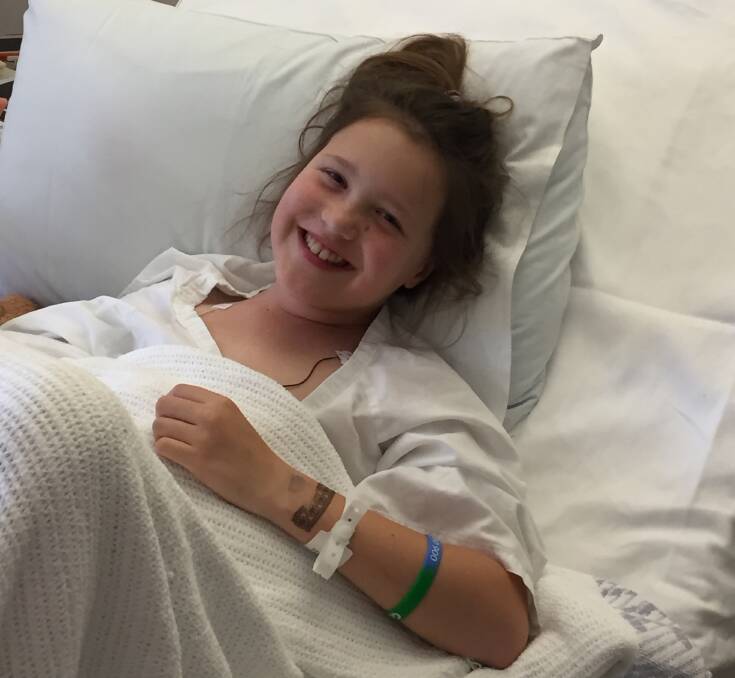 Abby is all smiles now the operation is over and her pacemaker has been updated. 