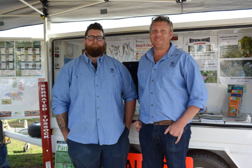 NOXIOUS WEEDS: Kane Davison and Brendon Roffe manned the Lachlan Valley Noxious Weeds Trailer at the Trundle Show. Photo by Hayley Woods. 