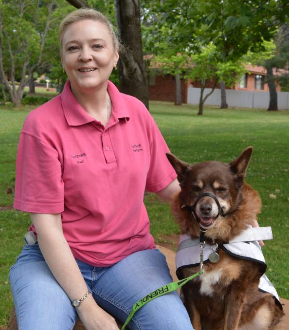 ESSENTIAL: Local dog trainer Gail Bartley believes a dog park is essential in Parkes. She is pictured with CJ, her 14-year-old long haired kelpie. Photo by Barbara Watt. 
