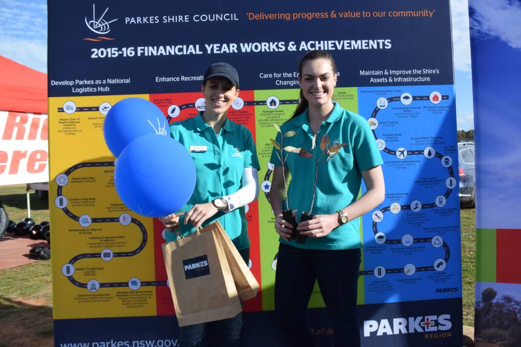 ON HAND: Emily Brotherton and Katrina Dwyer manned the Parkes Shire Council stall set up at the 2016 Trundle Show.