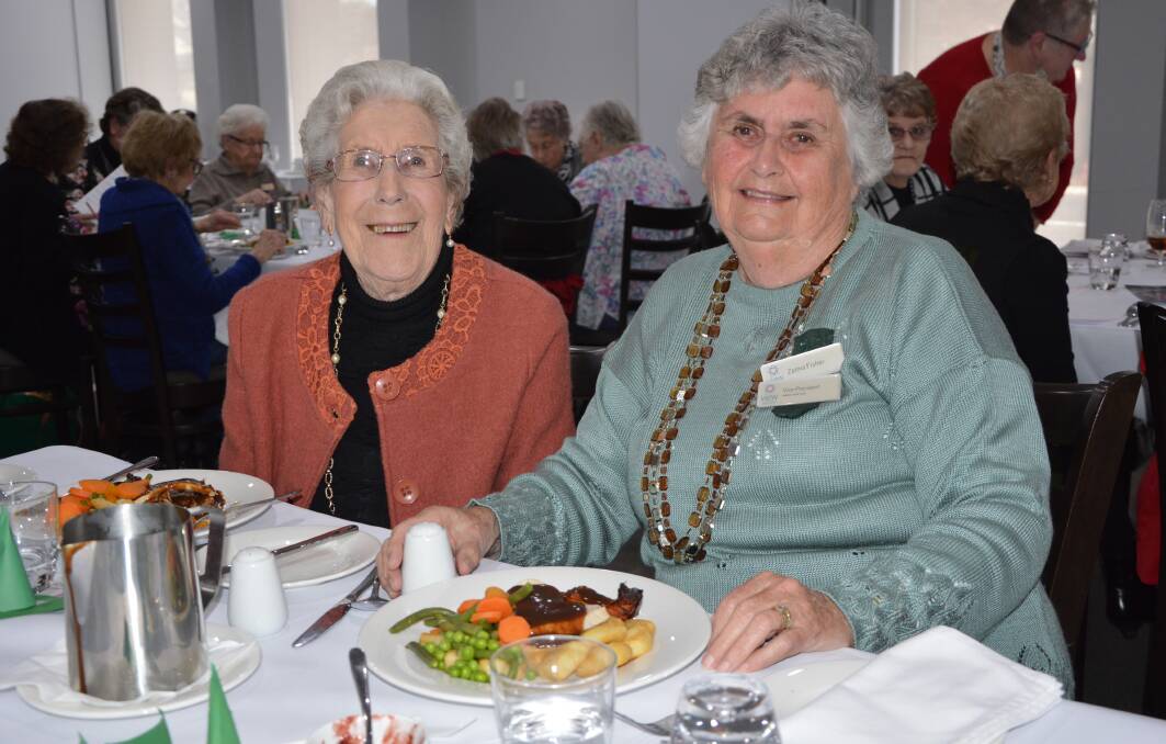 CELEBRATIONS: Shirley Barklimore and Vice President Zelma Fisher enjoyed the Day VIEW Club's Christmas in July luncheon last month. Photo: Barbara Watt.