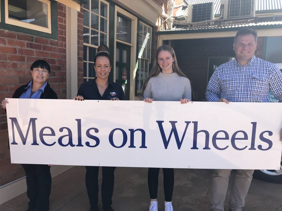 COMMUNITY SUPPORT: A visit to Meals on Wheels at Parkes (left to right) Gill Kinsela, Tash Butt, Emily McLachlan and Phil Donato. Photo: Supplied.
