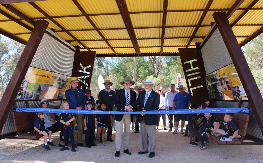 COME ON IN: NSW Minister for Tourism and Major Events Adam Marshall and Parkes mayor Ken Keith OAM opened the new entry shelter at the Peak Hill Gold Mine on Monday.