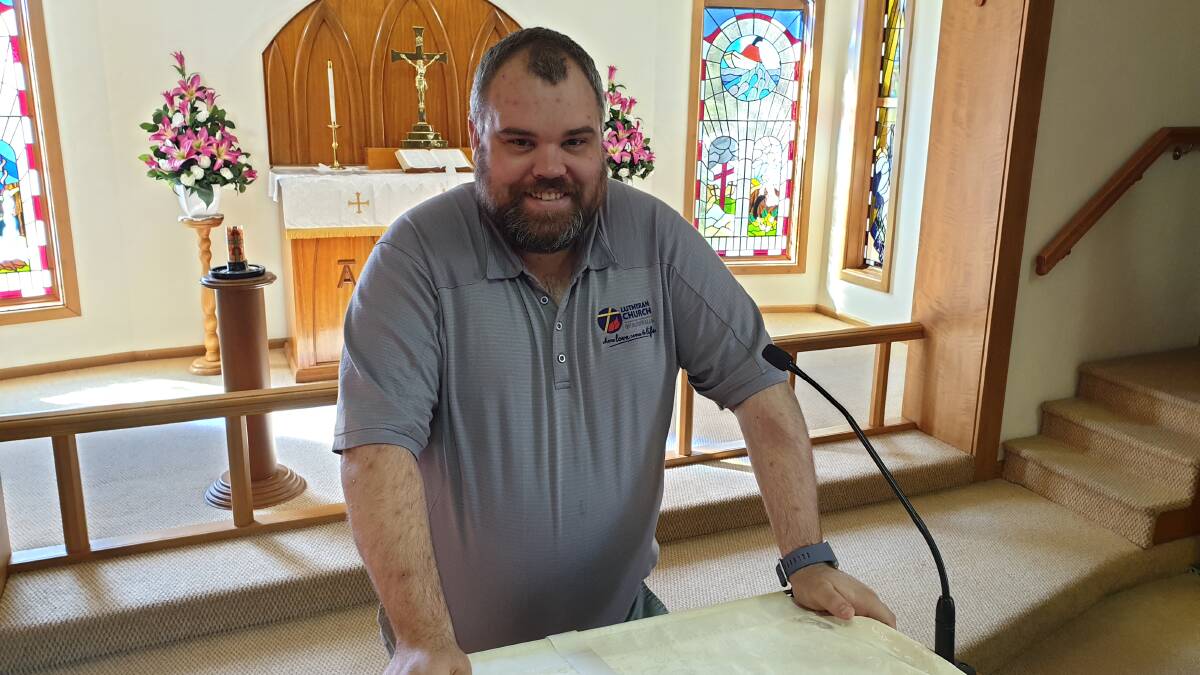 HAPPY CONGREGATION: Pastor James Leach is a welcome addition to St Paul's Lutheran Church in Parkes. 