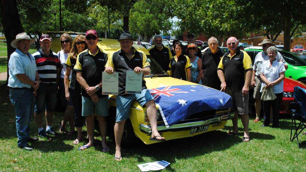 The Best Show: Rodney Barnes (club president) surrounded by members of the Central West Car Club at the Australia Day celebrations in Cooke Park.