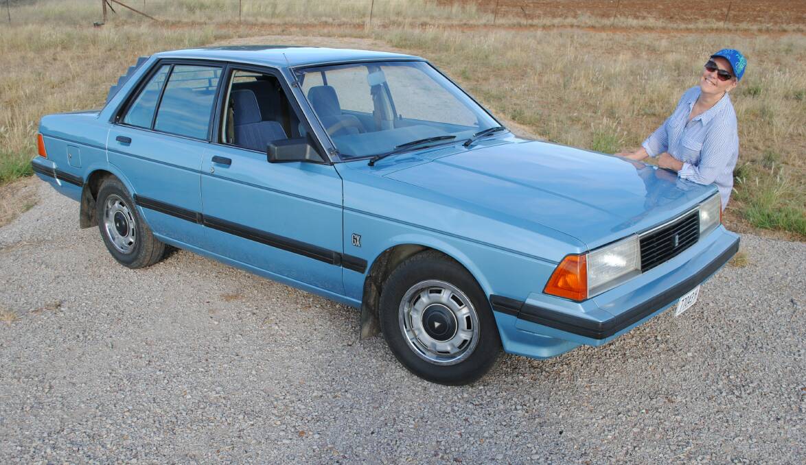 BLUE BEAUTY: Joan Paterson from Forbes with her 1984 Nissan Bluebird. Photo: Jeff McClurg