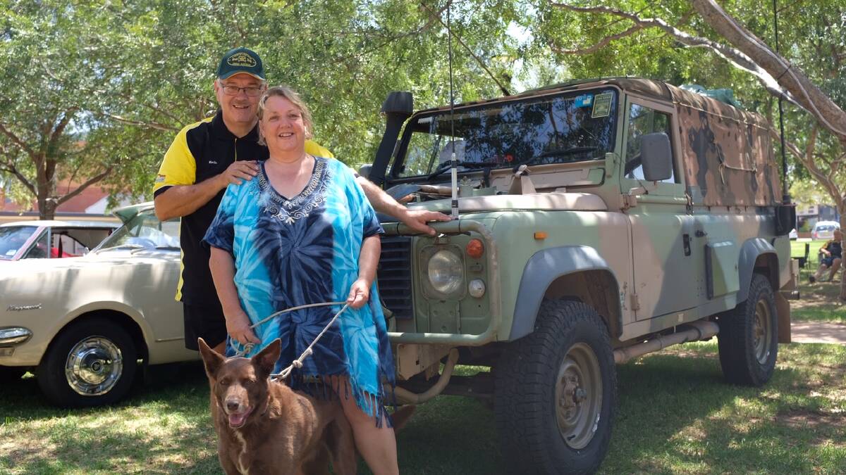 UNIQUE: Erik and Michelle Lensson, their dog Rusty and their Landrover 'Willis'. The Perentie has flow-through air conditioning for those hot summer days. Photo: Jeff McClurg