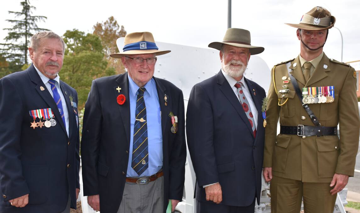Cr George Pratt, President Parkes RSL Sub Branch Terry Knowles, Parkes Mayor Ken Keith OAM and Lieutenant Colonel Dave Heatley after officially dedicating the refurbished cannon on Anzac Day. 