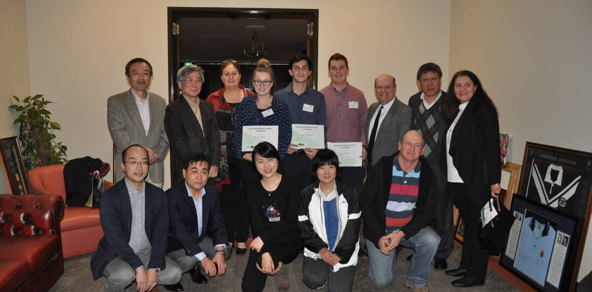 SMMO scholarship recipients with their families and representatives from SMMO.   