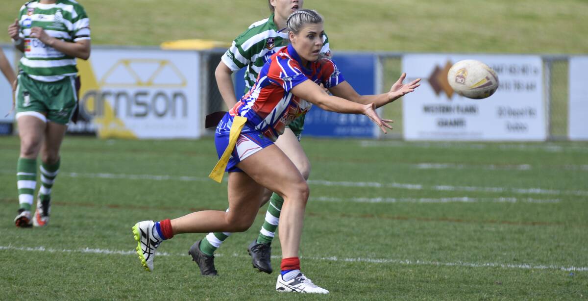 REP DUTIES: Sally Dwyer, seen here playing for the Parkes SpaceCats in the 2017 Group 11 league tag grand final, will be one of five Group 11 players in the Western Rams squad this weekend. Photo courtesy of Dubbo CYMS Footy Photos.   in 