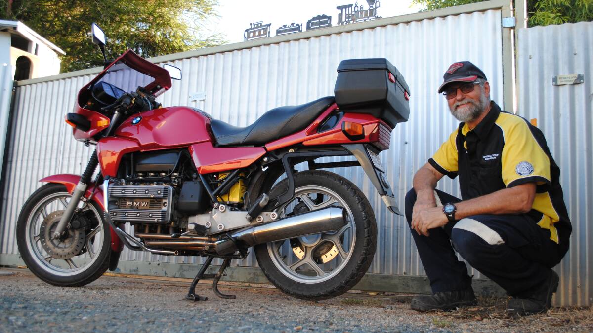 Never Planning to Part: Ian with his 1984 BMW K100 motorbike. The BMW K100 was also one of the first bikes with fuel injection and a single side swing arm at the rear. 