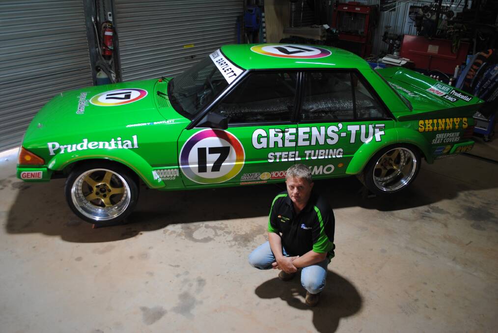 Green Machine: Steve Blaxland with his 1983 Falcon which he rebuild changed and now he's almost completed this XE Falcon Greens Tuf Tribute Race Car.