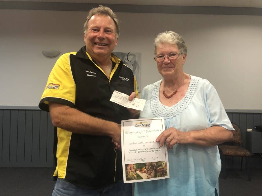 LOCAL SUPPORT: Rodney Barnes (CWCC President) presented the cheque to Pat Bailey from the Parkes branch of Can Assist. Photo: Supplied.