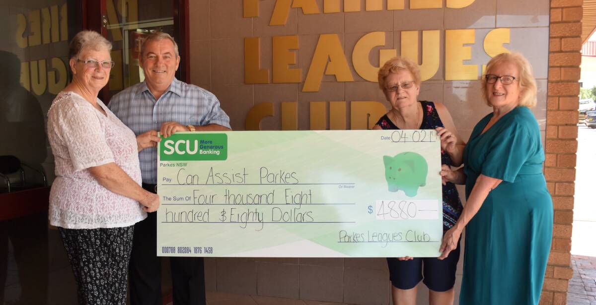 GENEROCITY: Can Assist members Pat Bailey, Adrienne Brown and Sylvia Glendenning accept the donation from Parkes Leagues Club Manager Greg Hornby. Photo: Barbara Reeves. 