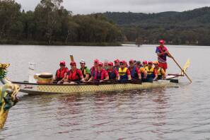BIRTHDAY PADDLE: Parkes Dragon Boat Club hosted paddlers from across the region for its fourth anniversary event at Lake Endeavour. Picture: SUPPLIED