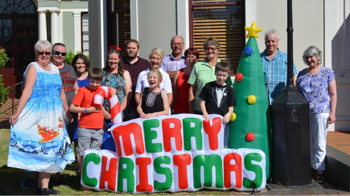 INVITED TO LUNCH: The happy team celebrating Christmas at the Forbes Town Hall in 2018. Photo supplied.