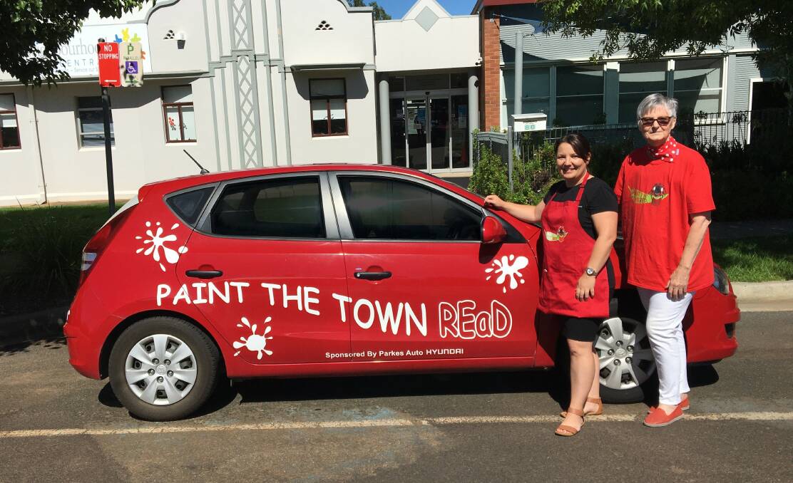 SPREAD THE WORD: Shonel Redfern and Rhonda Brain with the iconic Paint the Town REaD car. Picture: SUPPLIED