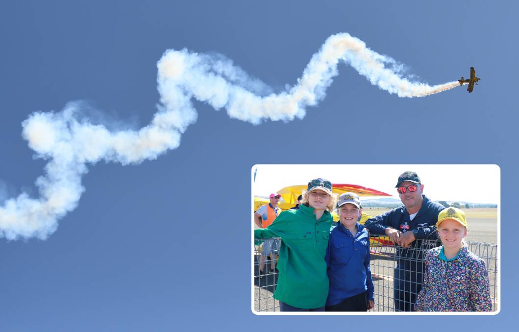 Paul Bennet Airshows thrilled the crowds at Parkes airport on Sunday and (inset) Oscar, George and Gloria were delighted to meet the pilot. 