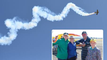 Paul Bennet Airshows thrilled the crowds at Parkes airport on Sunday and (inset) Oscar, George and Gloria were delighted to meet the pilot. 
