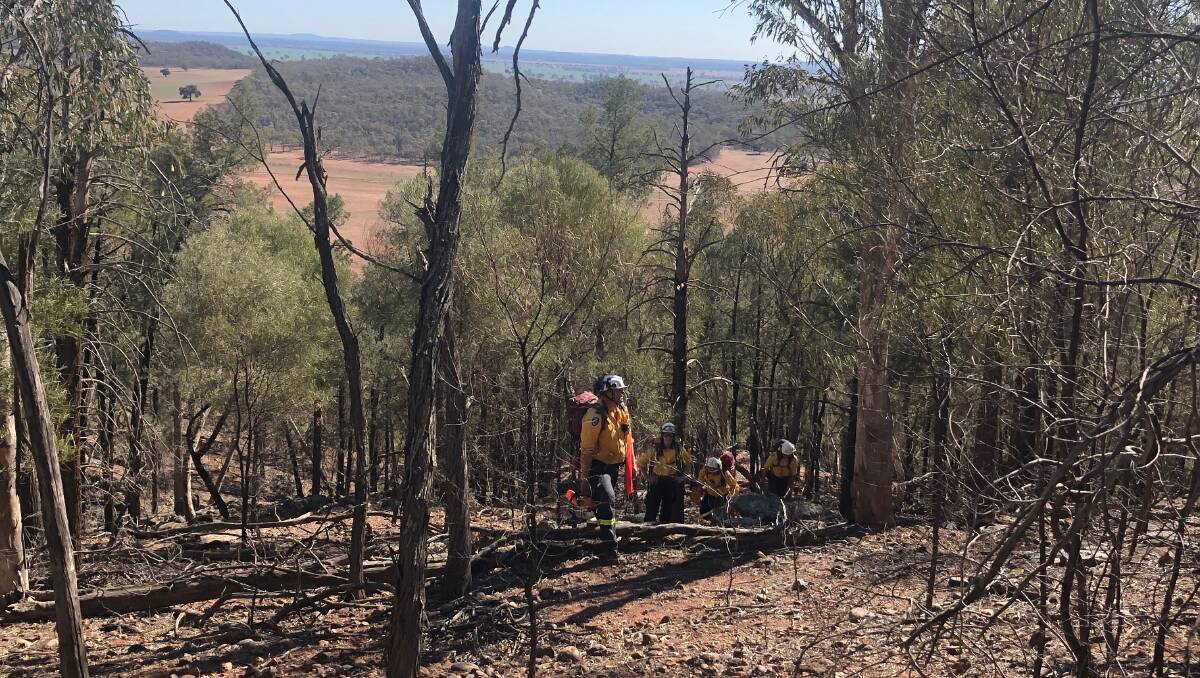 CONCERNED: The Mid Lachlan Valley RFS remote area firefighting team in training in preparation for the upcoming fire season. Photo: SUPPLIED