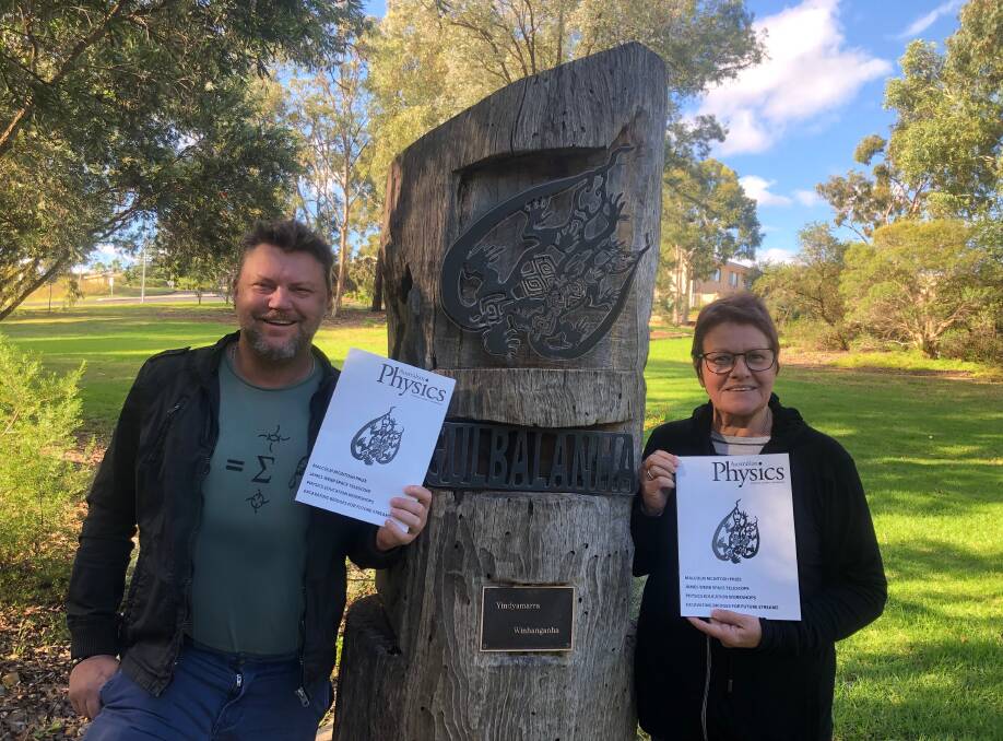 COVER STORY: Sean Cassidy and Kerrie Pedan with the Australian Physics edition featuring their work at Parkes' Rotary Peace Park. Picture: SUPPLIED