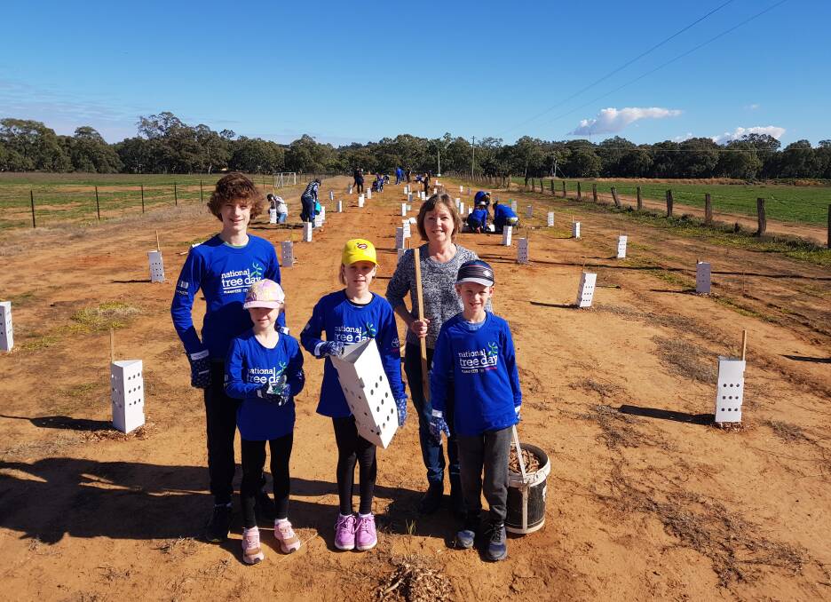 Happy planters at the Parkes 2019 National Tree Day event.