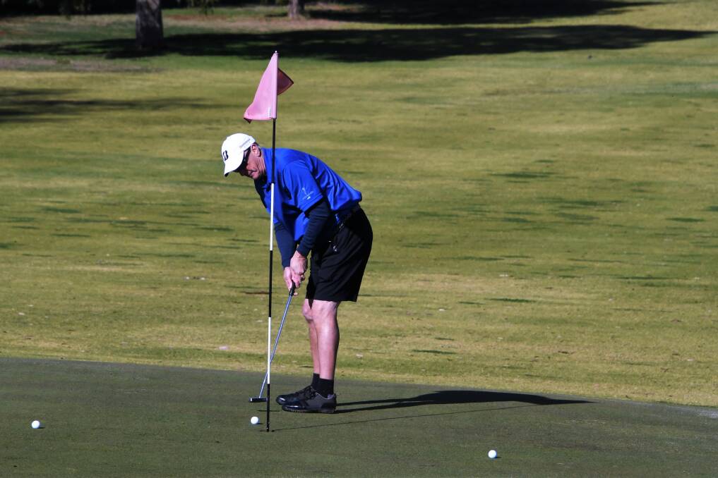 VETS GOLF WINNER: Peter Bristol sinks a putt on the picturesque Parkes greens. Picture: FILE