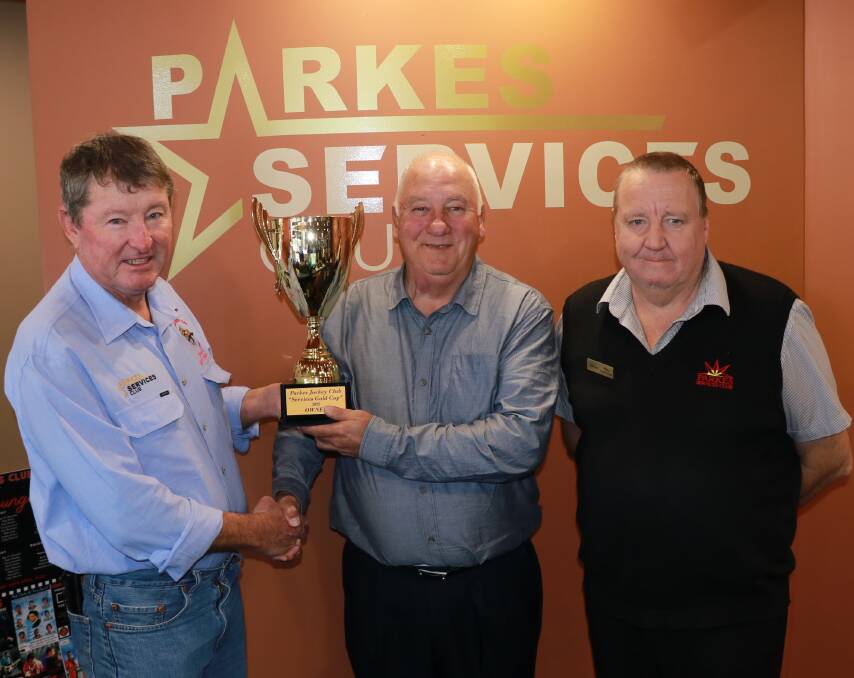 Parkes Jockey Club president Mark Ross, Cup-winning syndicate member Warwick Wheeldon, and Parkes Services Club CEO Mike Phillips. 