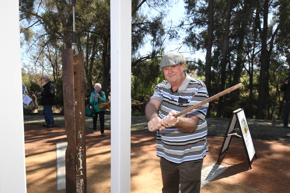 HOW IT'S DONE: Ian Dean was the farm bell ringer from 1965-1967. Photo: CARLA FREEDMAN