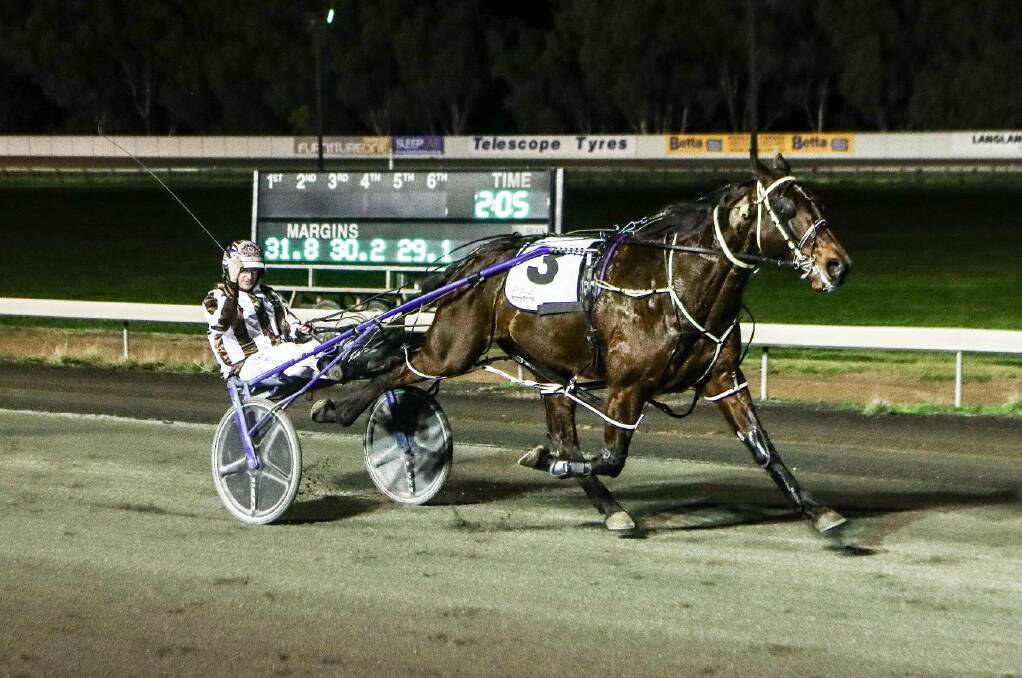 LEGENDARY MOMENT: Mat Rue wins with Art Legend to take his career tally of victorious drives to 1000. Photo: COFFEE PHOTOGRAPHY AND FRAMING