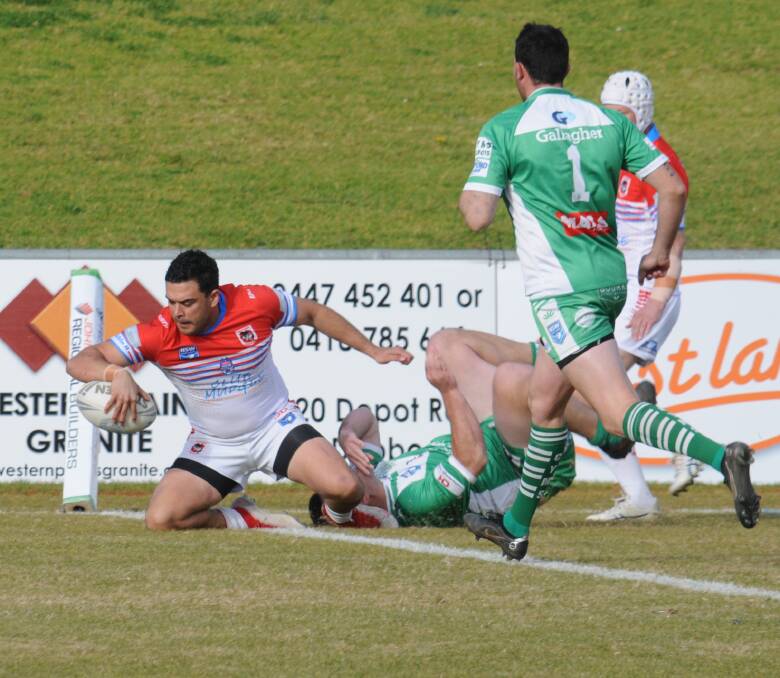 TRY TIME: Corin Smith crosses for the Mudgee Dragons earlier this season. After the Dragons beat Nyngan 64-24 on the weekend they now have the best attacking record in the Peter McDonald Premiership. Photo: NICK GUTHRIE