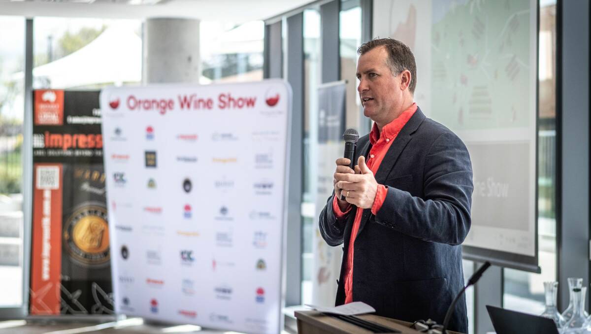 Jeff Byrne, from Byrne Farm, takes the stage during the Orange Wine Show. Picture supplied. 