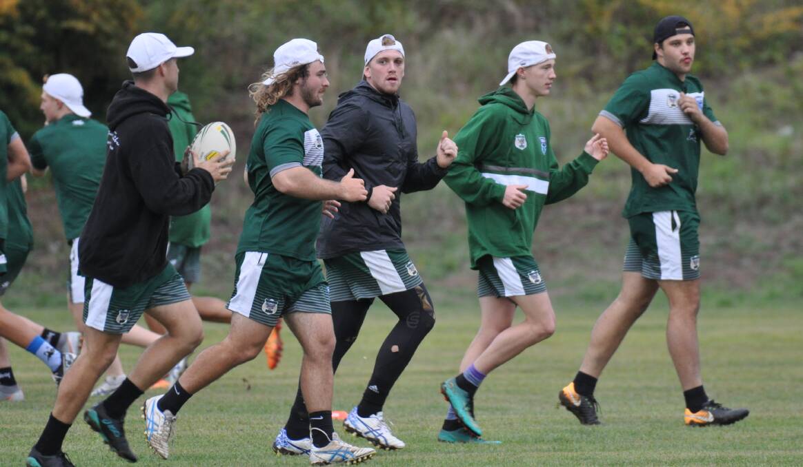 READY TO GO: Western's (from left) Mitch Burke of Forbes, Jay Slavin of Parkes, Cody Godden, Tom Toohey (Forbes) and Joey Hobby at Rams' training at Anzac Park, Orange, on Wednesday night. Photo: NICK McGRATH