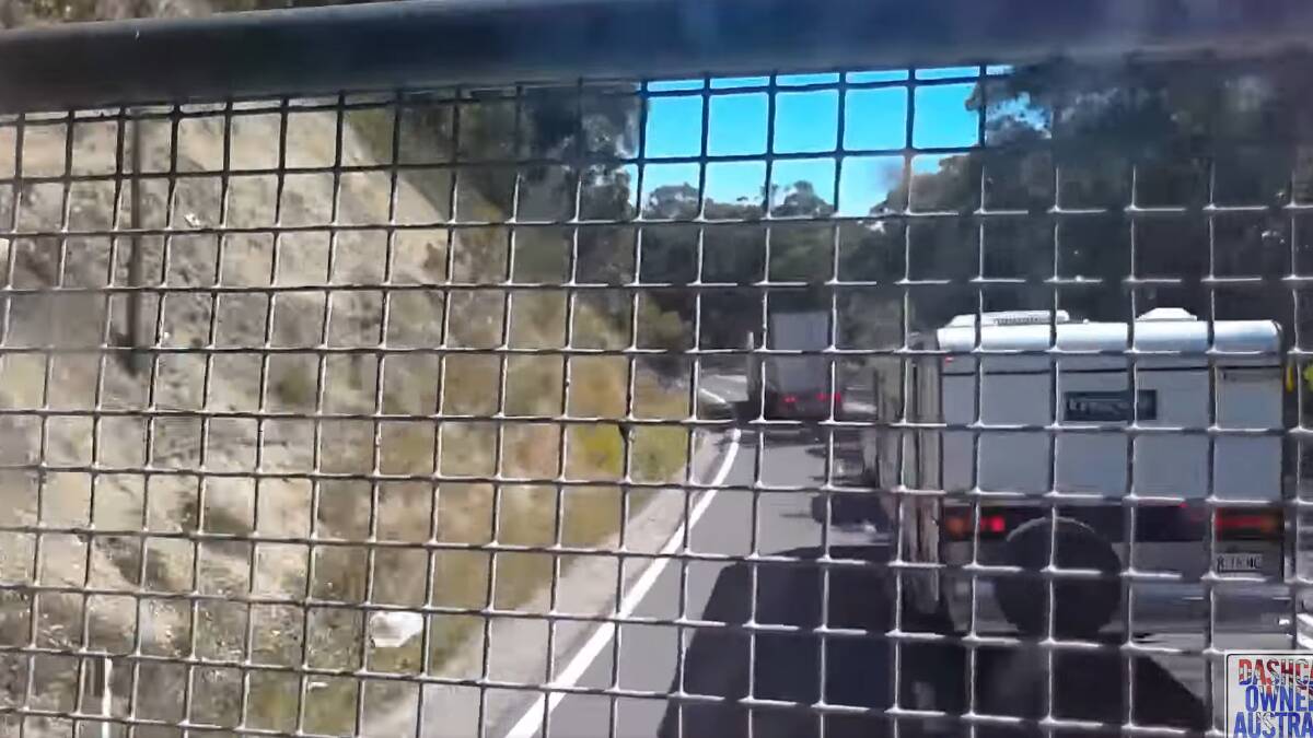 A screen grab of the footage as a truck with no brakes makes its way down Mount Victoria. Picture from Dash Cam Owners Australia Facebook page.