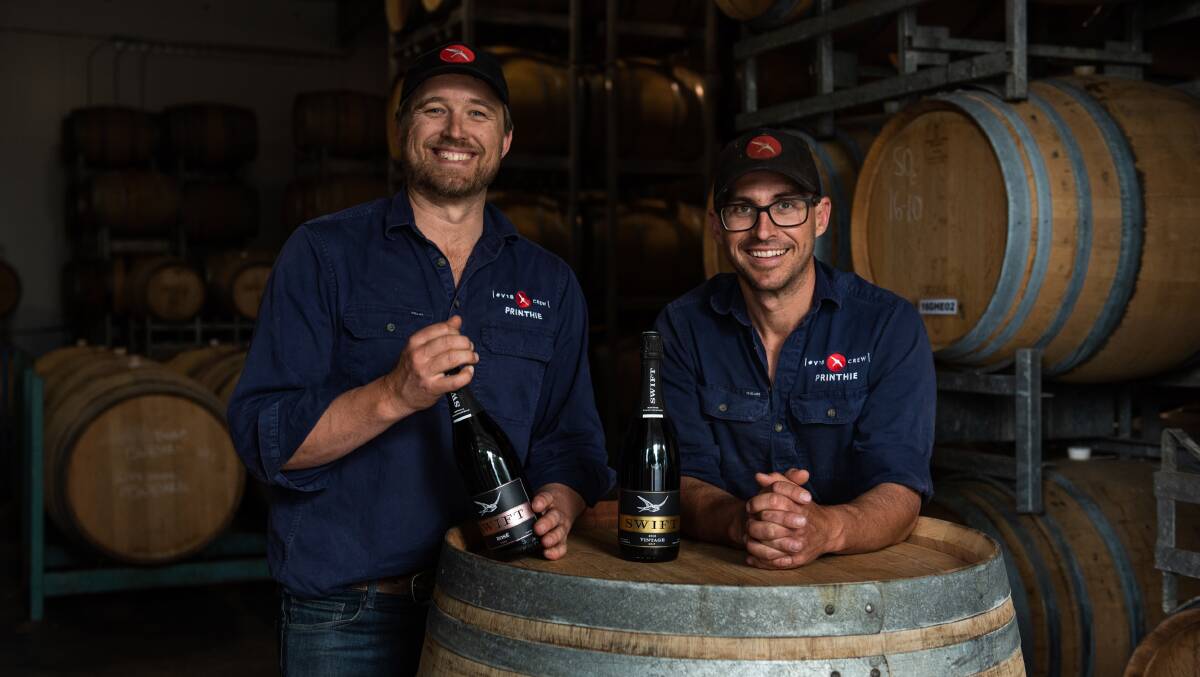 Printhie Wines owners Ed and Dave Swift at the Printhie Winery with bottles from their Swift Sparkling range. Picture supplied