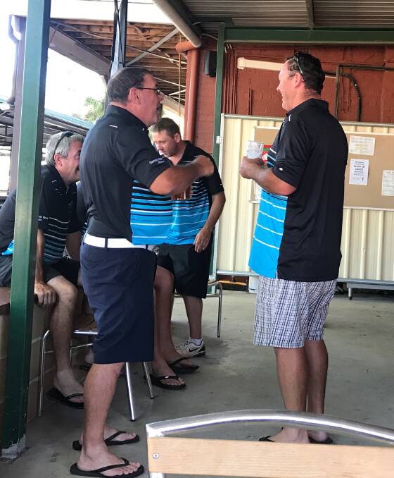Parkes pennants team members discuss their results after Round 2 of the CWDGA pennants last Sunday.