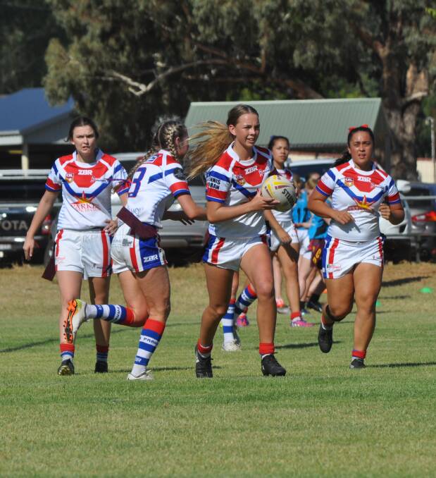 The Spacecats on the attack during their impressive start to the season in Canowindra last weekend.