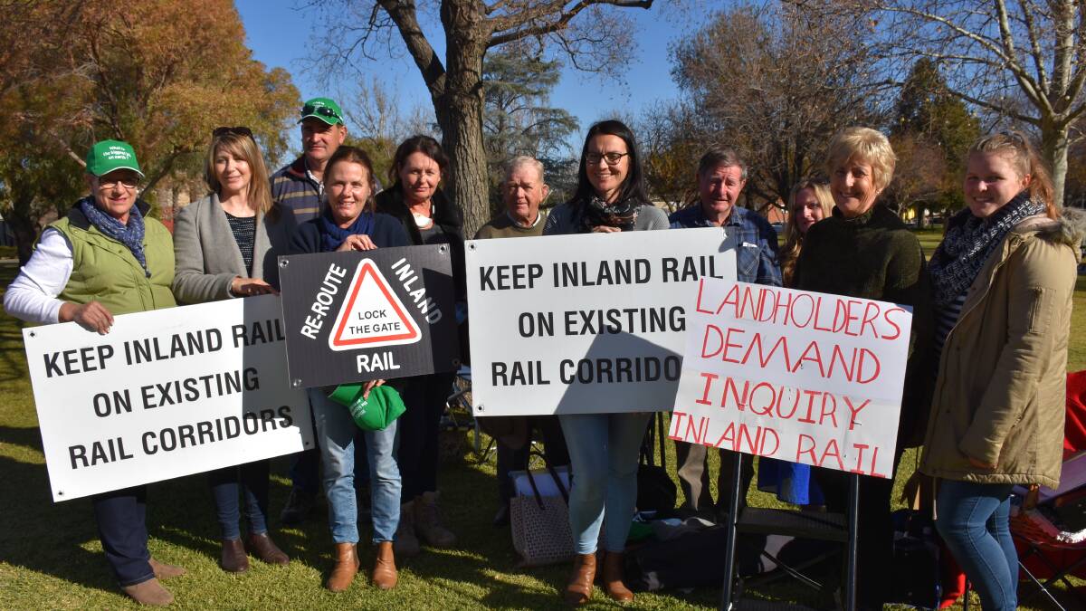 Inland Rail protesters in Parkes on Wednesday are calling for a review of the Inland Rail process.