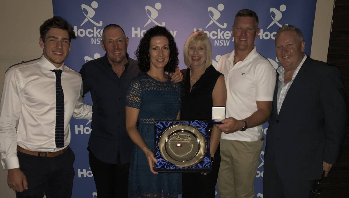 Glenn, Cherie, Mandy and Ian accepting the award from Hockey NSW CEO David Thompson (far right) and Parkes' Australian and NSW U21 representative, Kurt Lovett 